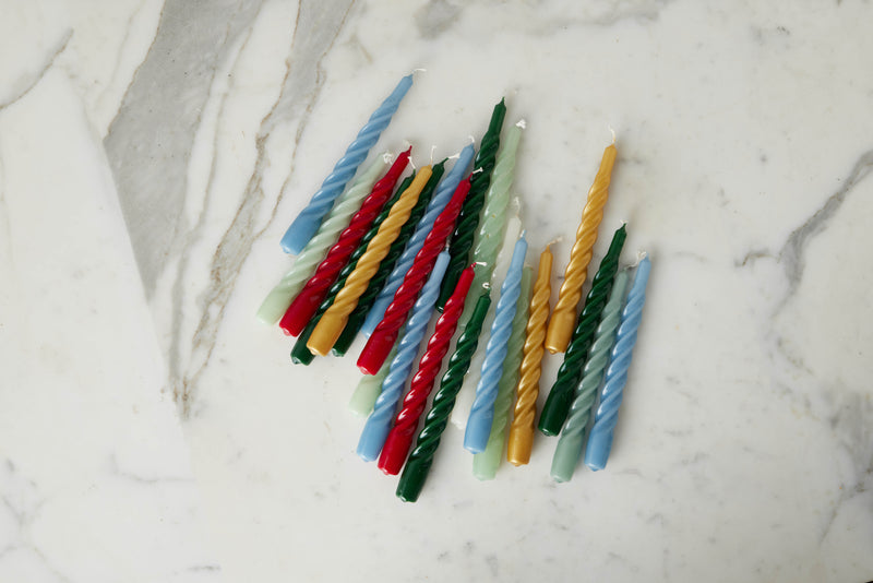 Lacquered twisted taper candles in Spruce, Sage, White, and Denim
